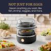 imageElite Gourmet EGC322CW Easy Egg Cooker Electric 7Egg Capacity Soft Medium HardBoiled Egg Cooker with Auto ShutOff Measuring Cup Included BPA Free Classic WhiteBlack