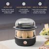imageElite Gourmet EGC322CW Easy Egg Cooker Electric 7Egg Capacity Soft Medium HardBoiled Egg Cooker with Auto ShutOff Measuring Cup Included BPA Free Classic WhiteBlack